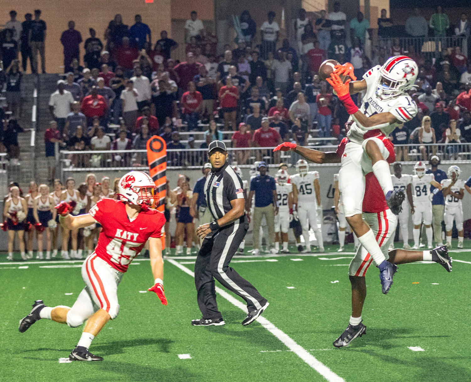 Katy’s Johnathan Hall breaks up a pass attempt to an Atascocita receiver during Friday’s game between Katy and Atascocita at Legacy Stadium.